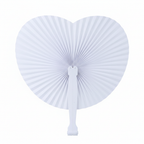 Close-up detail of white heart paper fan showing accordion fold texture and white plastic handle