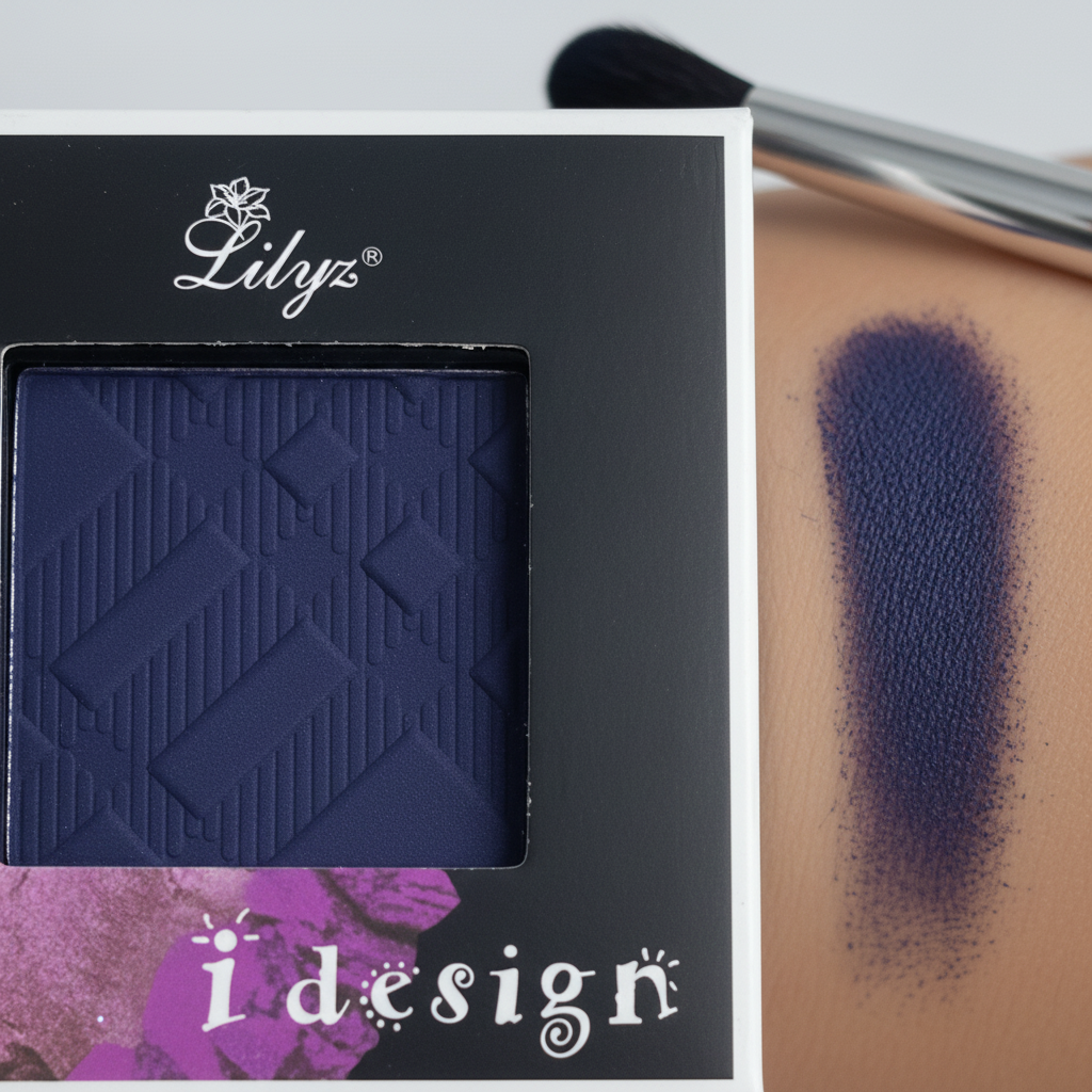 Close-up of Lilyz Eyeshadow Mono Navy Blue pigment with colour swatch on skin