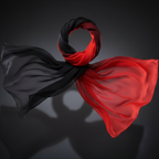 Red and black gradient chiffon scarf draped on dark background showing dramatic colour gradient and sheer fabric