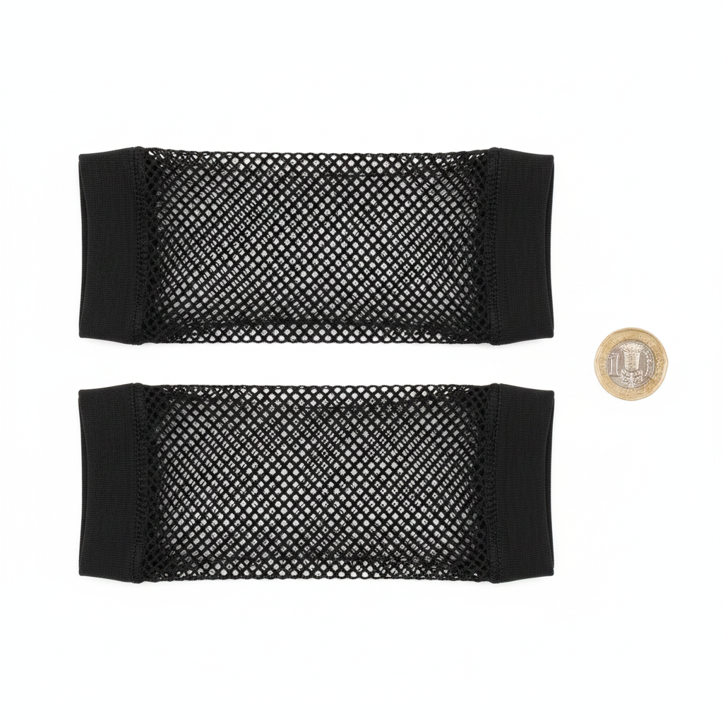 Long black fishnet net gloves laid flat on white background beside a UK £1 coin to show elbow length scale, overhead product photography