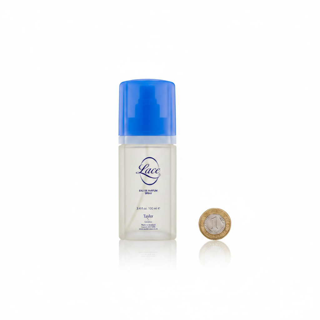 Taylor of London Lace EDP 100ml bottle flat lay beside £1 coin showing product scale on white background