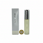 Milton Lloyd She JYUK perfume bottle and box flat lay beside British pound coin showing product scale