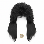 Men's 1980s black mullet wig flat lay on white background beside a £1 coin for scale reference showing full wig dimensions