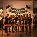 Young adults celebrating 18th birthday party with Sparkling Fizz black and gold banner