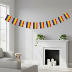 Rainbow Gay Pride Bunting with 11 rectangular flags displayed above a living room mantelpiece