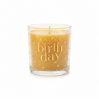 Happy Birthday Confetti Candle in clear glass jar with gold wax on white background — studio hero shot