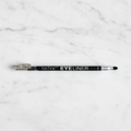 Technic Black Eyeliner Pencil with smudger and sharpener on white marble surface - professional product photography