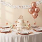 Elegant 80th birthday party table with Sparkling Fizz banner and rose gold decorations