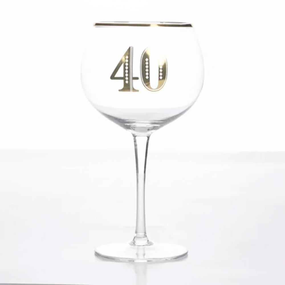 Art Deco 40th Birthday Gin Glass on pure white background, clear balloon gin glass with gold rim band and bold gold 40 numeral, Amazon hero shot