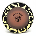W7 The Bronzer Matte Bronzing Powder Compact on pure white background, matte black compact with cream animal print pattern and deep warm brown powder pan