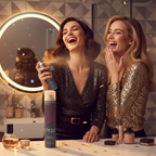 Woman spritzing Chique body spray getting ready for a night out with friends