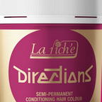 Extreme macro close-up of La Riche Directions Flamingo Pink hair dye tub showing gold label detail and craftsmanship