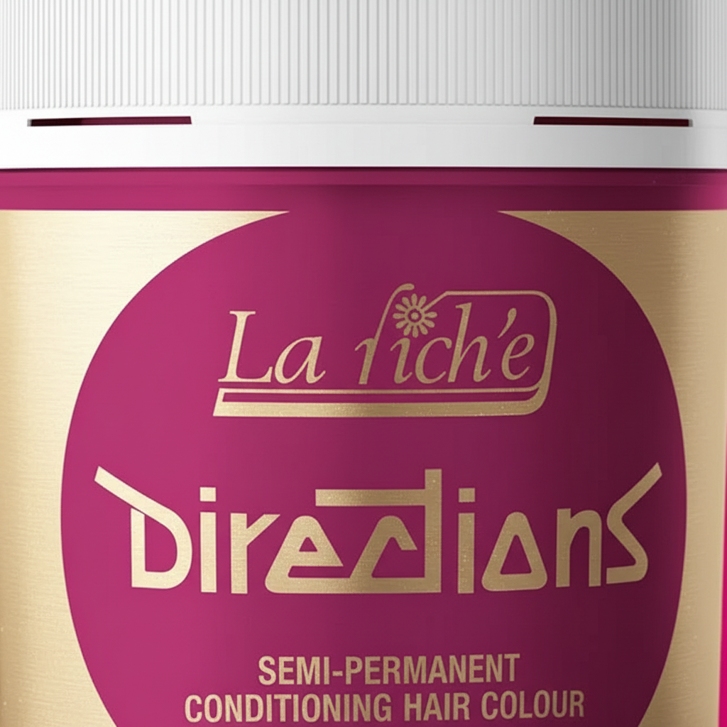 Extreme macro close-up of La Riche Directions Flamingo Pink hair dye tub showing gold label detail and craftsmanship