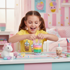 Young girl excitedly playing with Giggletastic Boba Slime Stack Toy at her colourful bedroom desk