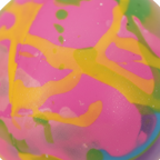 Extreme macro close-up of squishy graffiti ball surface showing vibrant swirled texture in pink, yellow-green, blue and purple with raking side light