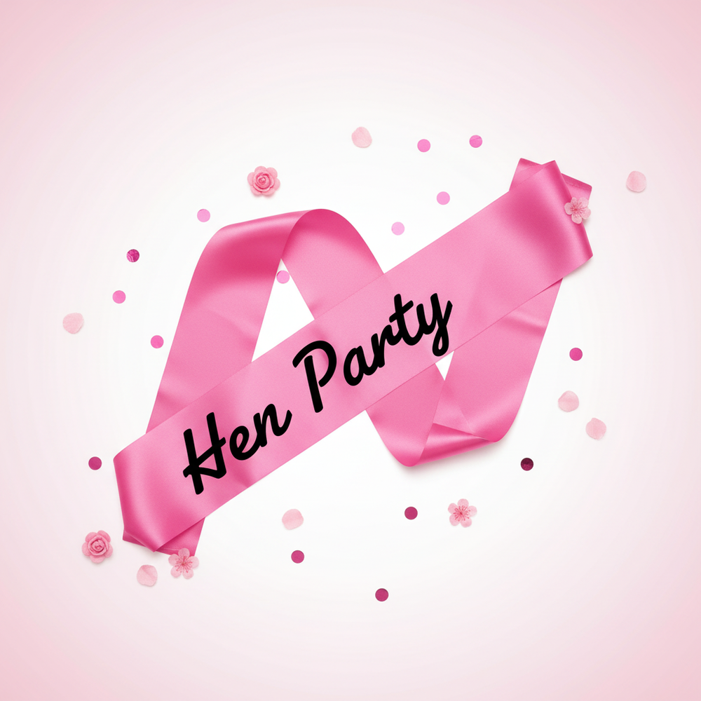 Hen Party Sash Pink With Black Writing displayed on a blush background with confetti - Why Not Shop