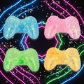 All four Stretch and Squeeze Game Controller Gel Toy colours in 2x2 grid on dark gaming background with neon glow and holographic glitter