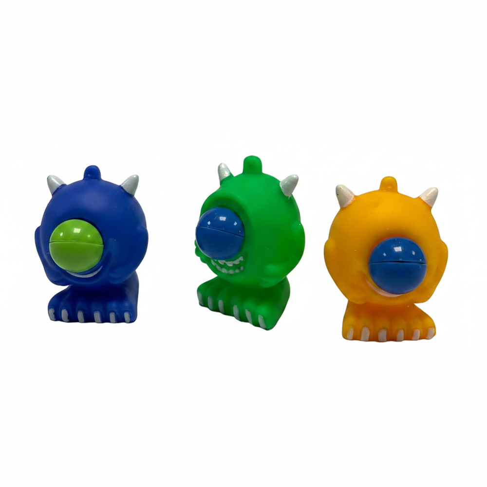 Google Eyed Squeeze Monster 6cm - three colour variants blue green yellow on white background hero shot