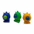 Google Eyed Squeeze Monster 6cm - three colour variants blue green yellow on white background hero shot