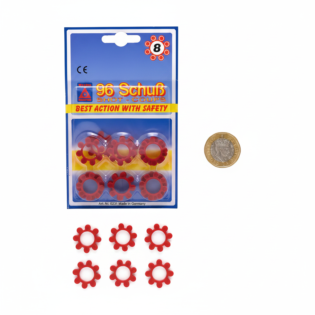 Flat lay of Sohni-Wicke cap gun rings pack and all 8 individual red rings beside a £1 coin on white background for scale