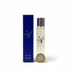 Immortal EDP 50ml clear glass bottle and navy blue box flat lay with £1 coin for scale — clean white background
