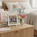 Silver Age 18 milestone photo frame displayed on a stylish bedroom shelf with fairy lights and birthday cards