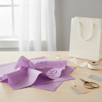 Purple tissue paper at a home gift-wrapping station with natural window light, interior lifestyle photography