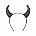 Black devil horns on a headband against a white background