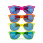 Giant plastic clown neon glasses in assorted colours — hot pink, orange, yellow and green — on white background
