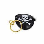 Black pirate eyepatch and gold hoop earring on white background