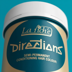 Extreme macro close-up of La Riche Directions Turquoise Hair Dye tub showing vivid turquoise finish and gold Directions lettering