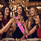 Group of women celebrating a birthday, birthday girl wearing Pink Satin Sash toasting with champagne