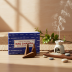 Satya Nag Champa Backflow Cones displayed in a serene home meditation corner with ceramic burner, pebbles and natural window light