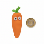 Crazy Squeezy Carrot squishy toy shown beside a £1 coin to demonstrate size