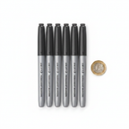 Swift Permanent Markers Black 6 Pack flat lay with British £1 coin for size reference — all 6 grey-bodied markers displayed on white background