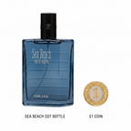 Real Time Sea Beach EDT 100ml bottle flat lay beside £1 coin showing product scale on white background