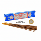 Satya Sai Baba Nag Champa 15g incense sticks flat lay beside a UK £1 coin showing product size, cobalt blue box and incense sticks on white background