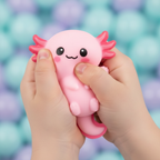 Close-up of child's hands squeezing a Smooshy Lotl axolotl toy showing soft squishy texture and cute face detail