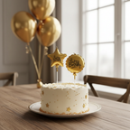 Gold metallic birthday candles on decorated cake in home setting