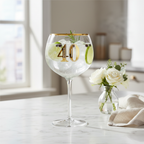 Art Deco 40th Birthday Gin Glass styled on marble countertop with botanicals and natural window light, interior lifestyle photography