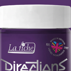 Extreme macro close-up of La Riche Directions Violet hair dye jar showing label detail, silver metallic text and violet finish