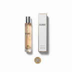 D&M Fragrances Blonde perfume bottle and box flat lay with £1 coin for scale on white background
