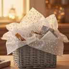Beautifully finished gift hamper overflowing with silver star tissue paper