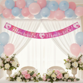 9ft holographic Mum To Be banner displayed at elegant baby shower with pastel decorations and balloons