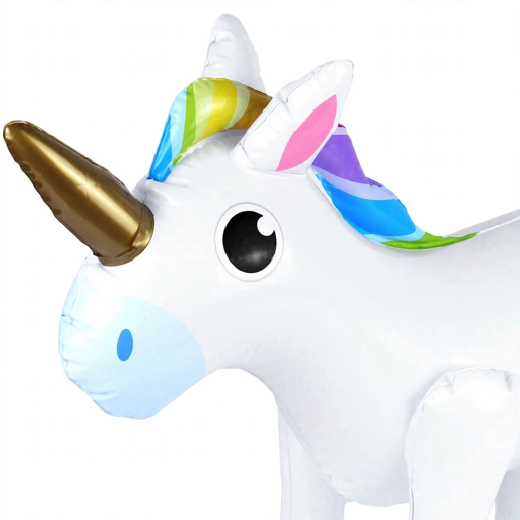 Close-up view of inflatable unicorn showing rainbow mane, gold horn, and printed facial features