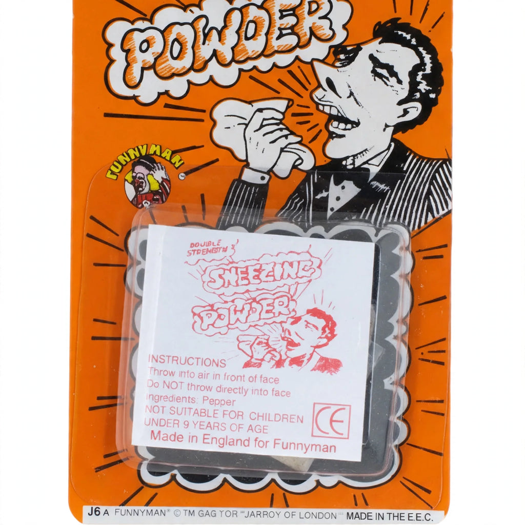 Close-up view of the Joke Sneezing Powder packet by Funnyman Jokes