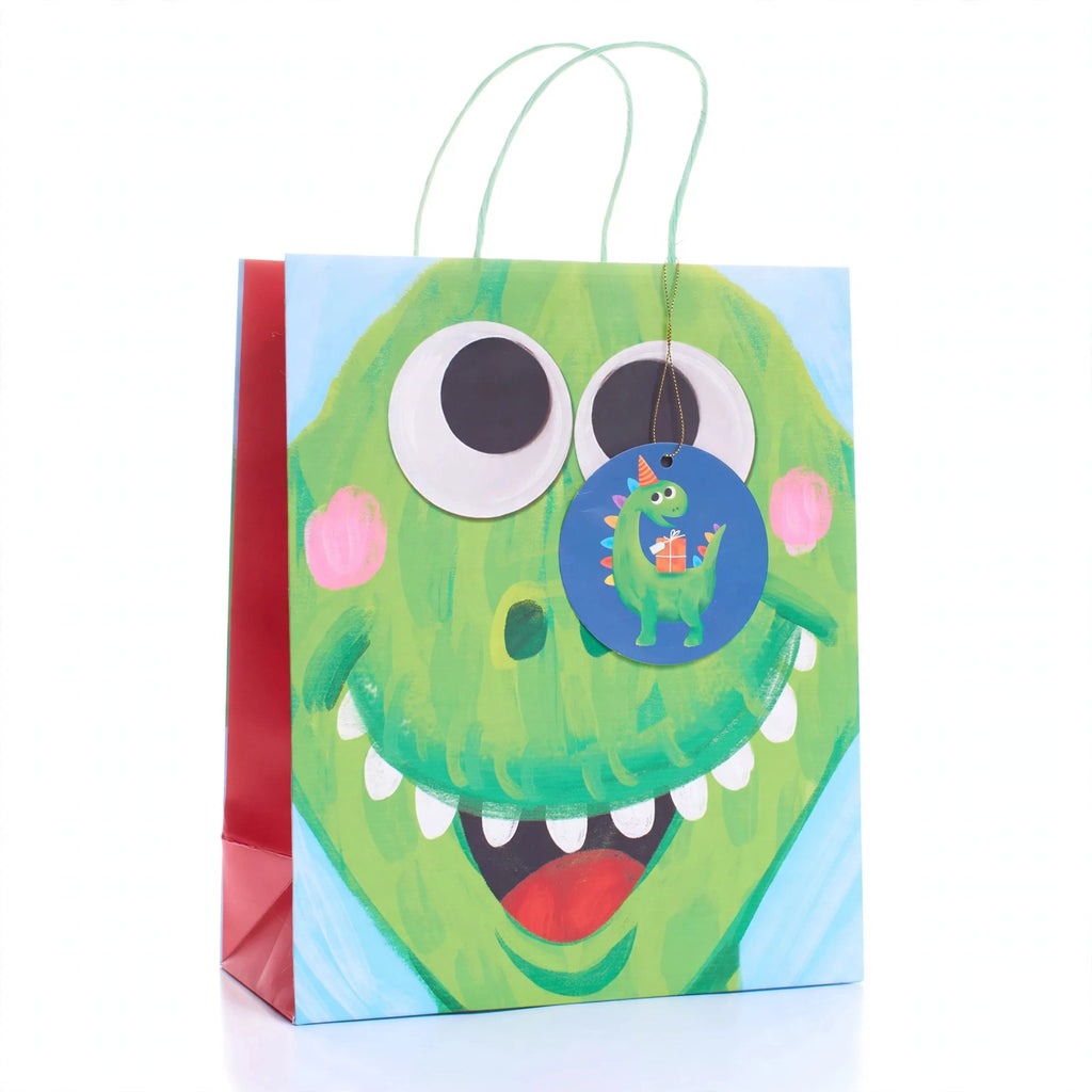 Medium kids gift bag with multi-coloured dinosaur print and ribbon carry handle