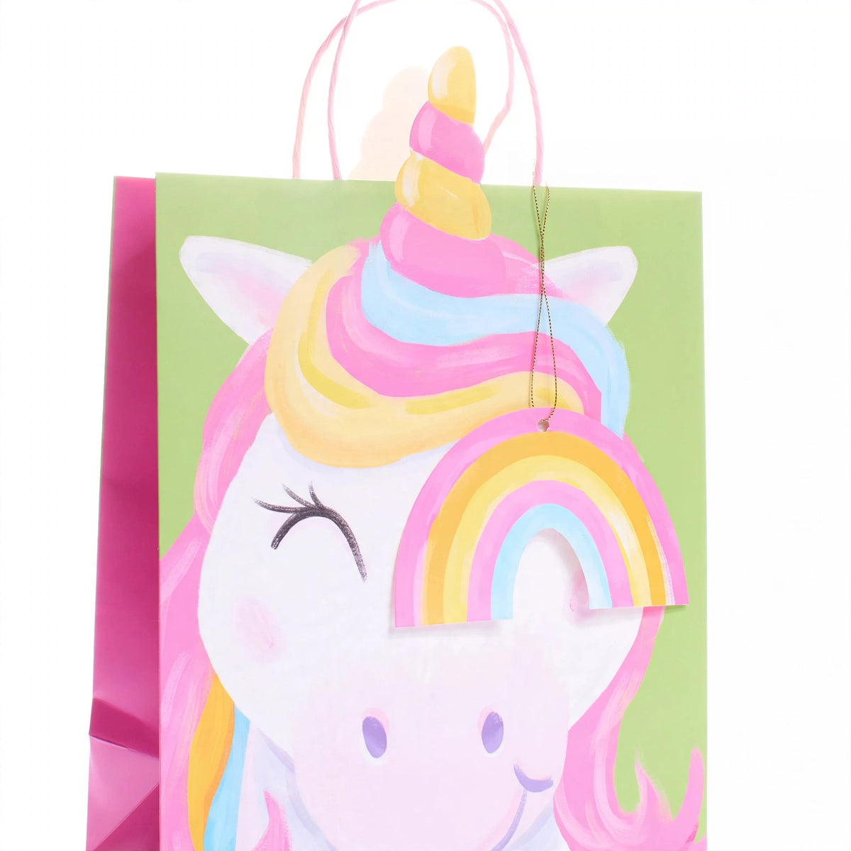 Close-up of multi-coloured unicorn print on medium kids gift bag
