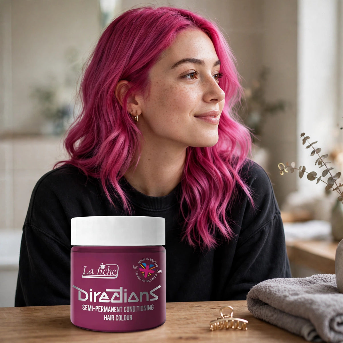 Person with hair dyed vivid cerise pink-magenta using La Riche Directions Cerise hair dye