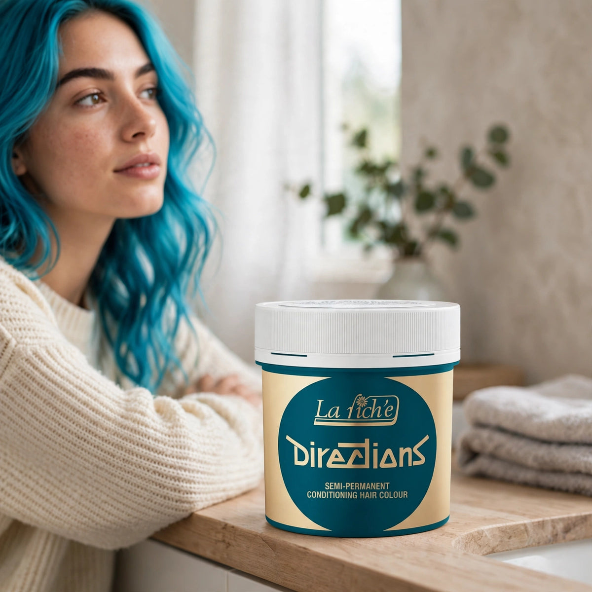 Turquoise semi-permanent hair dye used to create bold teal-blue hair colour
